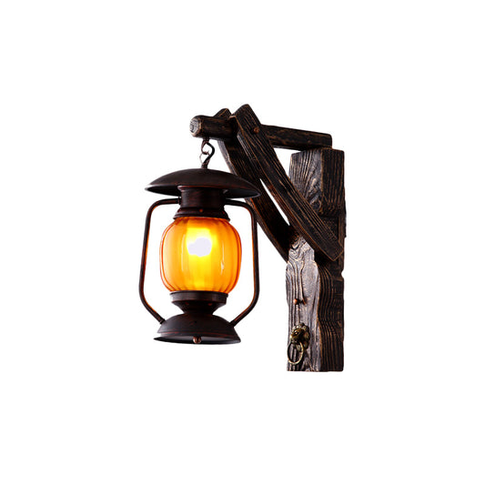 Amber Glass Lantern Wall Light Sconce Warehouse 1 Head Bedroom Wall Mount Lamp in Black with Wood Backplate Clearhalo 'Art deco wall lights' 'Cast Iron' 'Glass' 'Industrial wall lights' 'Industrial' 'Middle century wall lights' 'Modern' 'Rustic wall lights' 'Tiffany' 'Traditional wall lights' 'Wall Lamps & Sconces' 'Wall Lights' Lighting' 735166