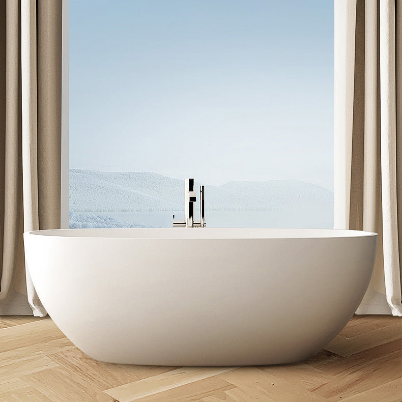 Modern Style Stone Bathtub White Detached Oval Bathtub for Bathroom 67"L x 31"W x 23"H Clearhalo 'Bathroom Remodel & Bathroom Fixtures' 'Bathtubs' 'Home Improvement' 'home_improvement' 'home_improvement_bathtubs' 'Showers & Bathtubs' 7359863