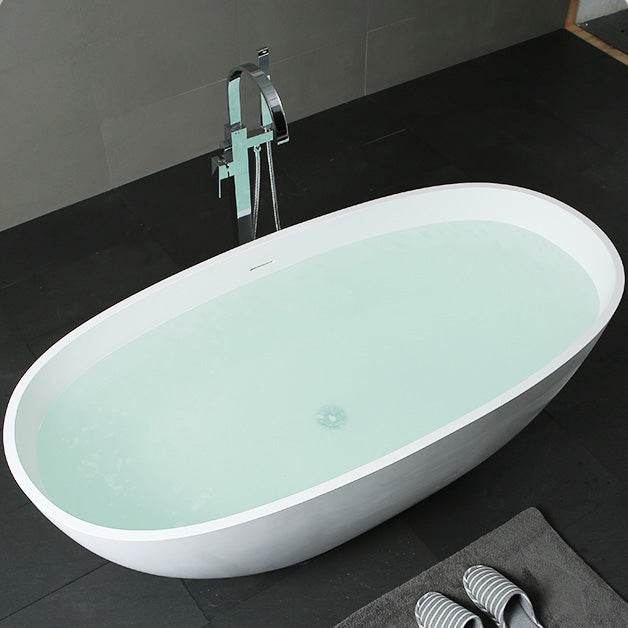 Modern Style Stone Bathtub White Detached Oval Bathtub for Bathroom 63"L x 31"W x 23"H Clearhalo 'Bathroom Remodel & Bathroom Fixtures' 'Bathtubs' 'Home Improvement' 'home_improvement' 'home_improvement_bathtubs' 'Showers & Bathtubs' 7359866