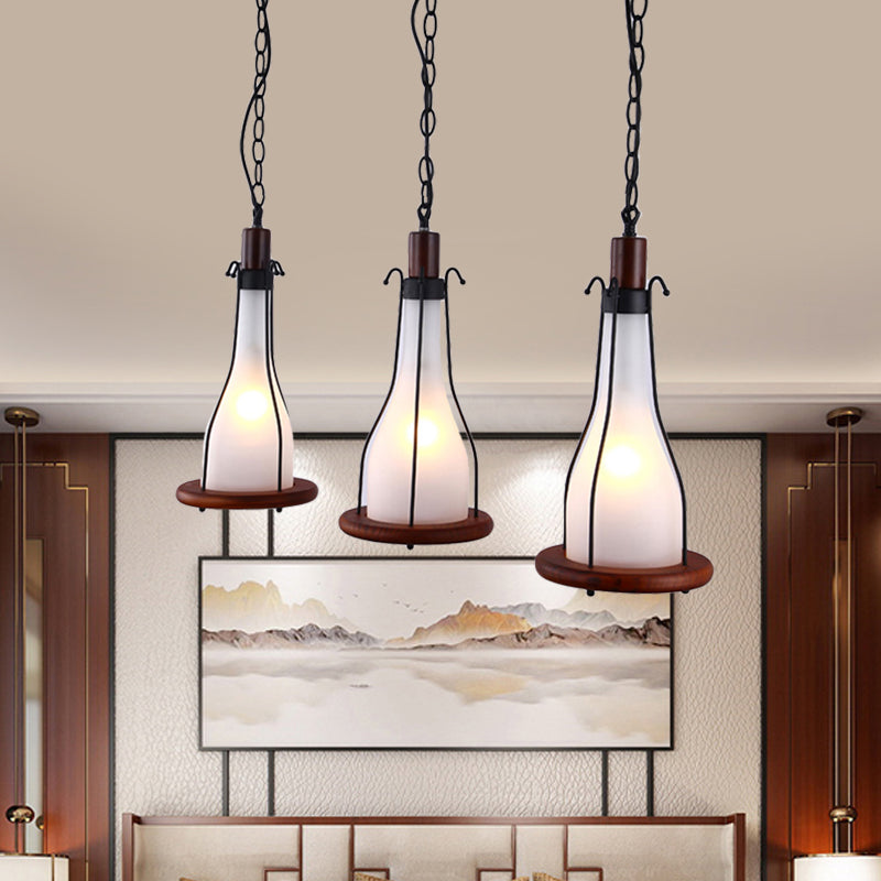 Brown Bottle Cluster Pendant Light Warehouse Yellow/White Glass 3 Heads Dining Room Ceiling Fixture with Wood Linear Canopy Clearhalo 'Art Deco Pendants' 'Cast Iron' 'Ceiling Lights' 'Ceramic' 'Crystal' 'Industrial Pendants' 'Industrial' 'Metal' 'Middle Century Pendants' 'Pendant Lights' 'Pendants' 'Tiffany' Lighting' 736181