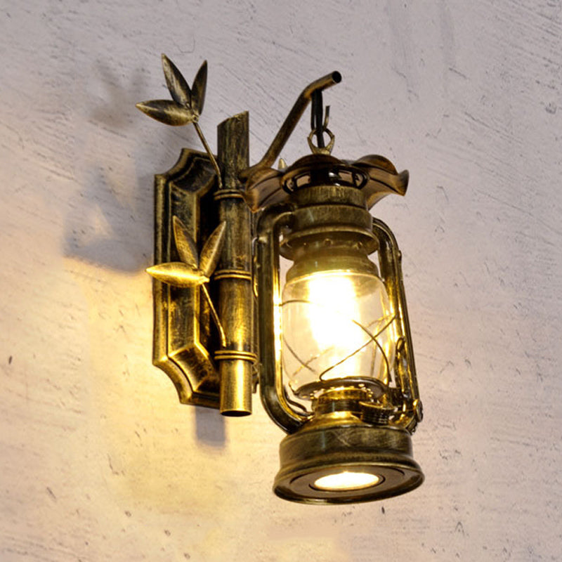 Industrial Lantern Sconce 1 Head Clear Glass Wall Mount Light Fixture in Bronze/Copper with Metal Bamboo Backplate Clearhalo 'Art deco wall lights' 'Cast Iron' 'Glass' 'Industrial wall lights' 'Industrial' 'Middle century wall lights' 'Modern' 'Rustic wall lights' 'Tiffany' 'Traditional wall lights' 'Wall Lamps & Sconces' 'Wall Lights' Lighting' 736350
