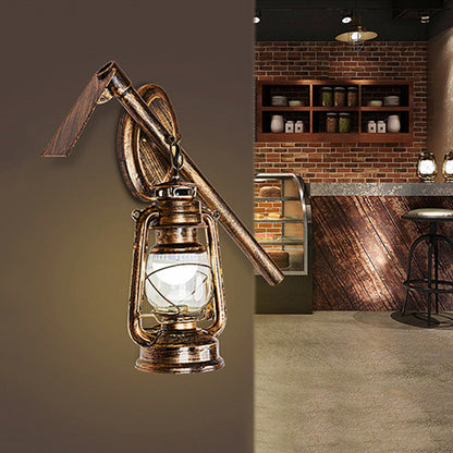 Lantern Clear Glass Wall Hanging Light Vintage 1 Bulb Living Room Sconce Lighting Fixture in Bronze with Metal Hoe Deco Bronze Clearhalo 'Art deco wall lights' 'Cast Iron' 'Glass' 'Industrial wall lights' 'Industrial' 'Middle century wall lights' 'Modern' 'Rustic wall lights' 'Tiffany' 'Traditional wall lights' 'Wall Lamps & Sconces' 'Wall Lights' Lighting' 736379