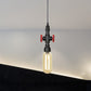 1 Light Ball/Capsule Suspension Light Industrial Black Finish Amber Glass Ceiling Pendant Pipe Lamp Clearhalo 'Ceiling Lights' 'Glass shade' 'Glass' 'Industrial Pendants' 'Industrial' 'Middle Century Pendants' 'Pendant Lights' 'Pendants' 'Tiffany' Lighting' 737468