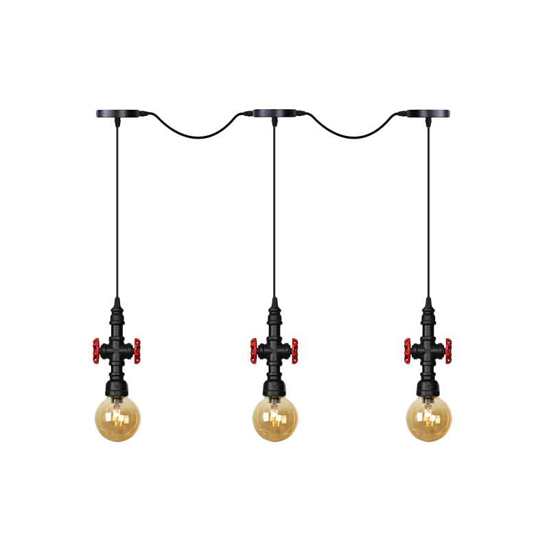 Antiqued Sphere Multi Light Chandelier 3/5/7-Bulb Amber Glass Tandem LED Suspension Pendant in Black Clearhalo 'Ceiling Lights' 'Glass shade' 'Glass' 'Industrial Pendants' 'Industrial' 'Middle Century Pendants' 'Pendant Lights' 'Pendants' 'Tiffany' Lighting' 738921
