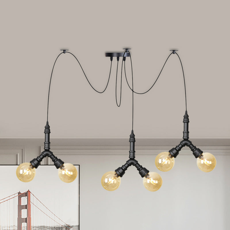 Amber Glass Globe Swag Multi Ceiling Light Industrial 4/6/12 Lights Restaurant LED Pendulum Lamp in Black Clearhalo 'Ceiling Lights' 'Glass shade' 'Glass' 'Industrial Pendants' 'Industrial' 'Middle Century Pendants' 'Pendant Lights' 'Pendants' 'Tiffany' Lighting' 738972