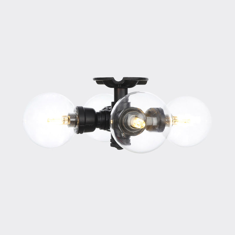 Industrial-Style Orb Semi Flush Light 3/4 Lights Clear Glass LED Flushmount Lamp in Black Clearhalo 'Ceiling Lights' 'Close To Ceiling Lights' 'Close to ceiling' 'Glass shade' 'Glass' 'Semi-flushmount' Lighting' 754131