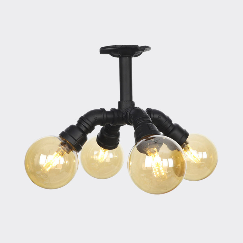 Black Ball Semi-Flush Ceiling Light Industrial Amber Glass 4/5/6-Light Foyer LED Flushmount Clearhalo 'Ceiling Lights' 'Close To Ceiling Lights' 'Close to ceiling' 'Glass shade' 'Glass' 'Semi-flushmount' Lighting' 756731