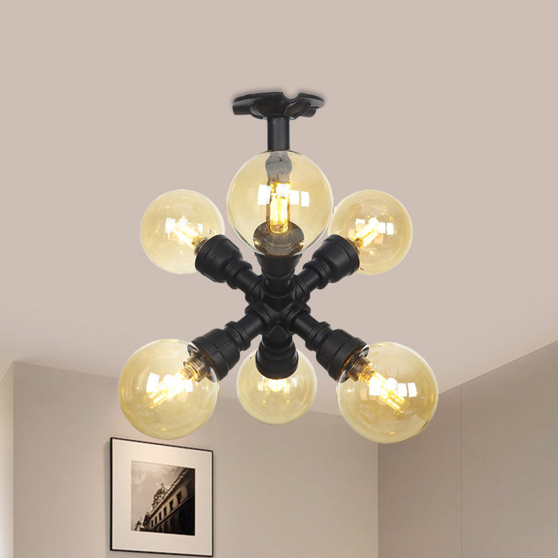 Black Ball Semi-Flush Ceiling Light Industrial Amber Glass 4/5/6-Light Foyer LED Flushmount Clearhalo 'Ceiling Lights' 'Close To Ceiling Lights' 'Close to ceiling' 'Glass shade' 'Glass' 'Semi-flushmount' Lighting' 756739