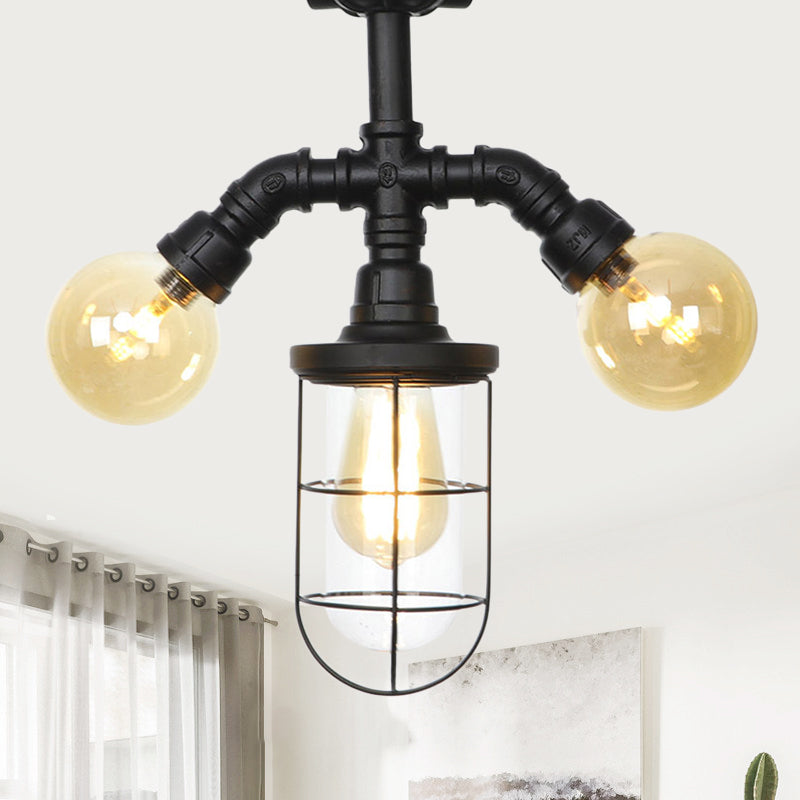 Clear Glass Ball/Capsule Flush Light Industrial 3-Head Foyer Semi Flush Mount in Black with Cage Black F Clearhalo 'Ceiling Lights' 'Close To Ceiling Lights' 'Close to ceiling' 'Glass shade' 'Glass' 'Pendant Lights' 'Semi-flushmount' Lighting' 758557