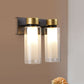 Brass Dual Cylinder Sconce Light Fixture Post-Modern 2 Bulbs Clear Glass LED Wall Mount Lamp Clearhalo 'Cast Iron' 'Glass' 'Industrial' 'Modern wall lights' 'Modern' 'Tiffany' 'Traditional wall lights' 'Wall Lamps & Sconces' 'Wall Lights' Lighting' 758911