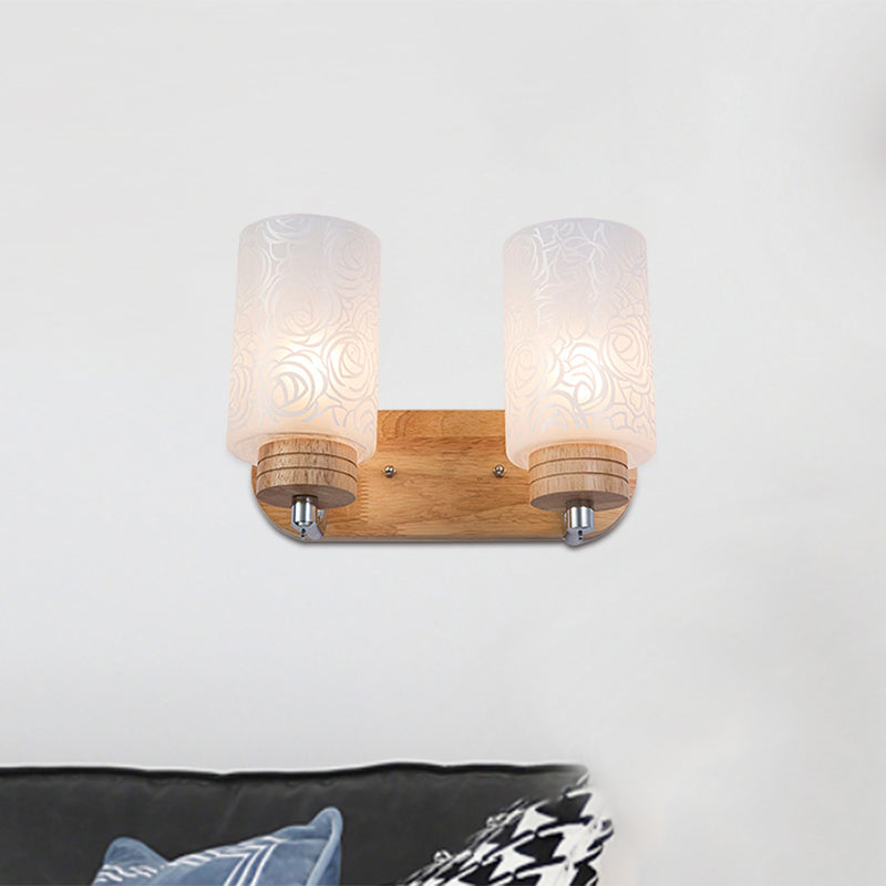 White Glass Cylinder Wall Light Sconce Modern 2 Heads Wood Wall Mount Lamp Fixture with Rose Pattern Wood Clearhalo 'Modern wall lights' 'Modern' 'Wall Lamps & Sconces' 'Wall Lights' Lighting' 759041