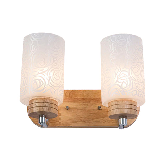 White Glass Cylinder Wall Light Sconce Modern 2 Heads Wood Wall Mount Lamp Fixture with Rose Pattern Clearhalo 'Modern wall lights' 'Modern' 'Wall Lamps & Sconces' 'Wall Lights' Lighting' 759042