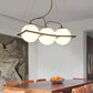 Globe Multi Light Pendant Modernist Frosted Glass 3/4 Lights Black Frame Ceiling Hang Fixture Clearhalo 'Ceiling Lights' 'Modern Pendants' 'Modern' 'Pendant Lights' 'Pendants' Lighting' 759203