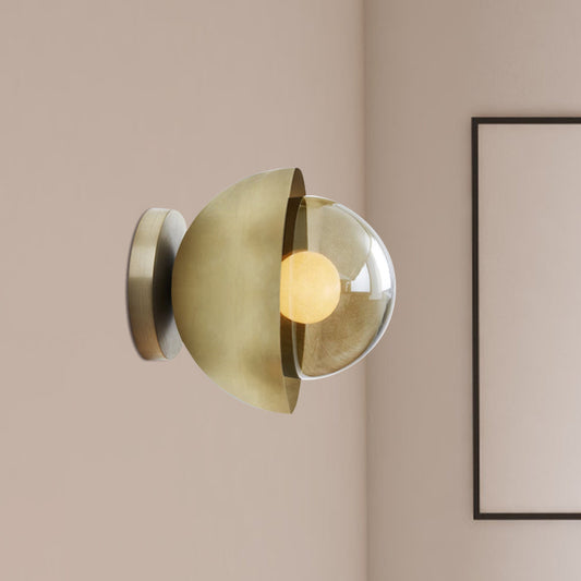 Metallic Semicircle Sconce Lighting Modernist 1-Light Brass/Chrome Wall Lamp Fixture with Orb Tan Glass Shade for Corridor Brass Clearhalo 'Cast Iron' 'Glass' 'Industrial' 'Modern wall lights' 'Modern' 'Tiffany' 'Traditional wall lights' 'Wall Lamps & Sconces' 'Wall Lights' Lighting' 763257