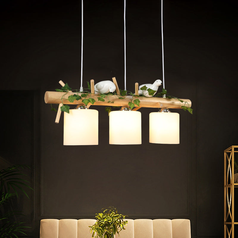 Cylinder Milky Glass Hanging Pendant Industrial 3-Light Coffee Shop Island Light Fixture with Wooden Stick and Bird Clearhalo 'Ceiling Lights' 'Glass shade' 'Glass' 'Island Lights' Lighting' 767259