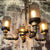 4 Bulbs Cylinder Chandelier Lamp with Mesh Screen Vintage Bronze Finish Iron Hanging Pendant Light Bronze Clearhalo 'Cast Iron' 'Ceiling Lights' 'Chandeliers' 'Industrial Chandeliers' 'Industrial' 'Metal' 'Middle Century Chandeliers' 'Rustic Chandeliers' 'Tiffany' Lighting' 768587
