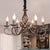 Vintage Stylish Candle Chandelier Lamp 6 Bulbs Wrought Iron Hanging Lighting with Curved Arm in Bronze Bronze Clearhalo 'Cast Iron' 'Ceiling Lights' 'Chandeliers' 'Industrial Chandeliers' 'Industrial' 'Metal' 'Middle Century Chandeliers' 'Rustic Chandeliers' 'Tiffany' Lighting' 768673