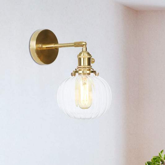 Clear Glass Globe Wall Lamp Rotatable Vintage Single Wall Sconce Light in Gold for Porch Clearhalo 'Cast Iron' 'Glass' 'Industrial wall lights' 'Industrial' 'Middle century wall lights' 'Modern' 'Tiffany' 'Traditional wall lights' 'Wall Lamps & Sconces' 'Wall Lights' Lighting' 769596