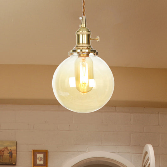 Industrial Indoor Lighting with Globe Glass Shade and Adjustable Cord 1 Light Amber Pendant Light Clearhalo 'Ceiling Lights' 'Close To Ceiling Lights' 'Glass shade' 'Glass' 'Industrial Pendants' 'Industrial' 'Middle Century Pendants' 'Pendant Lights' 'Pendants' 'Tiffany' Lighting' 769675