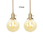 Industrial Indoor Lighting with Globe Glass Shade and Adjustable Cord 1 Light Amber Pendant Light Amber 2 Clearhalo 'Ceiling Lights' 'Close To Ceiling Lights' 'Glass shade' 'Glass' 'Industrial Pendants' 'Industrial' 'Middle Century Pendants' 'Pendant Lights' 'Pendants' 'Tiffany' Lighting' 769678