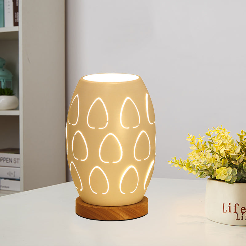 Modernist Oblong Night Light Metal 1 Head Bedroom Night Table Lamp in White with Hollow Out Design Clearhalo 'Lamps' 'Table Lamps' Lighting' 780570