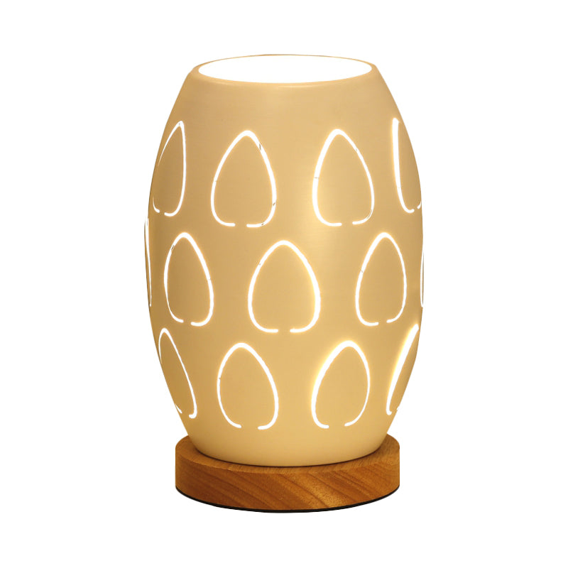 Modernist Oblong Night Light Metal 1 Head Bedroom Night Table Lamp in White with Hollow Out Design Clearhalo 'Lamps' 'Table Lamps' Lighting' 780571