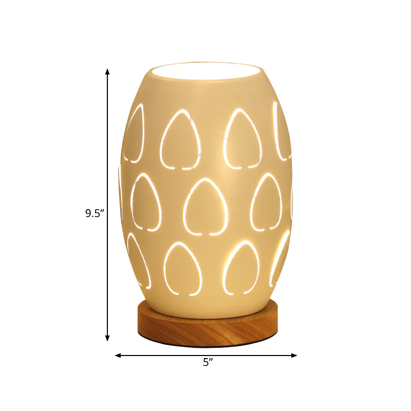 Modernist Oblong Night Light Metal 1 Head Bedroom Night Table Lamp in White with Hollow Out Design Clearhalo 'Lamps' 'Table Lamps' Lighting' 780572