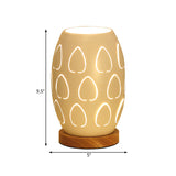 Modernist Oblong Night Light Metal 1 Head Bedroom Night Table Lamp in White with Hollow Out Design Clearhalo 'Lamps' 'Table Lamps' Lighting' 780572