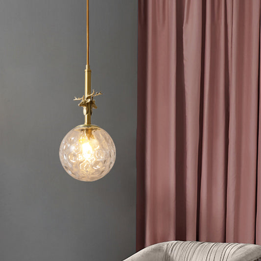 Traditional Sphere Pendulum Light 1 Head Clear Dimpled Glass Hanging Ceiling Lamp in Brass Clearhalo 'Ceiling Lights' 'Close To Ceiling Lights' 'Glass shade' 'Glass' 'Pendant Lights' 'Pendants' Lighting' 782218