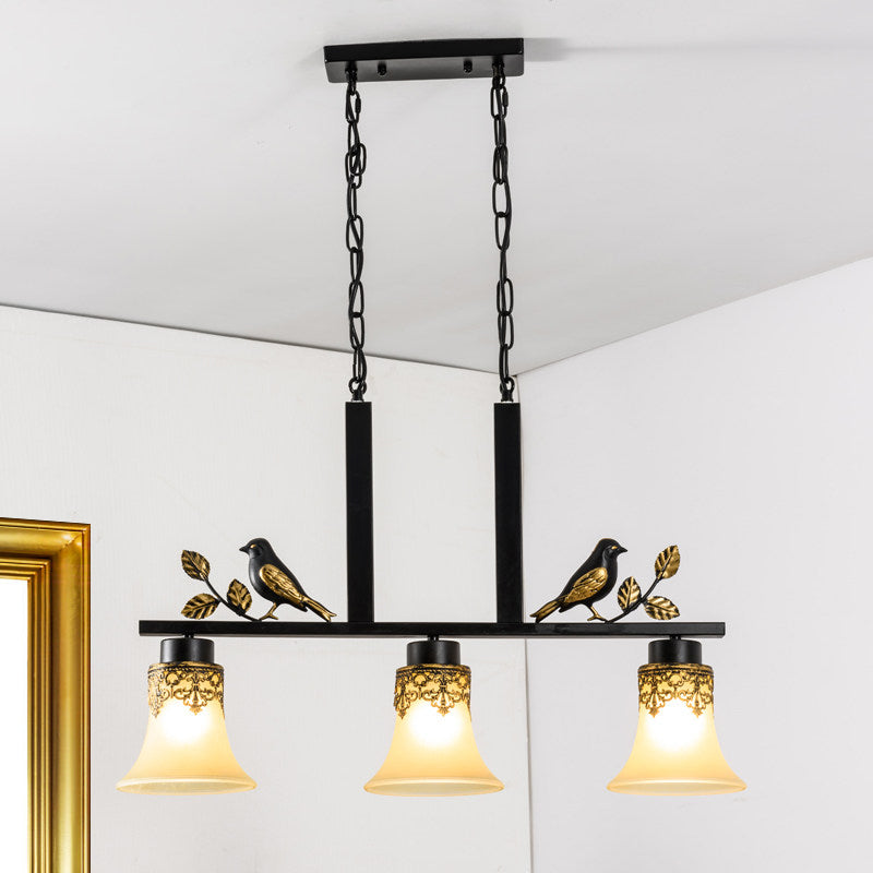 3 Heads Tan Glass Island Light Pendant Traditional Black Finish Bell Dining Room Ceiling Lamp with Bird Deco Clearhalo 'Ceiling Lights' 'Island Lights' Lighting' 785451