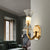 Brass Curvy Wall Mount Lamp Postmodern 1 Head Clear and Frosted Glass Sconce Light for Parlor Brass Clearhalo 'Cast Iron' 'Glass' 'Industrial' 'Modern wall lights' 'Modern' 'Tiffany' 'Traditional wall lights' 'Wall Lamps & Sconces' 'Wall Lights' Lighting' 786615