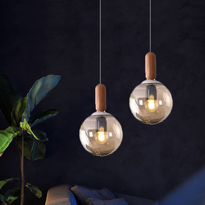 Sphere Kitchen Pendant Lighting White/Cognac Glass 1 Light Minimalist Hanging Lamp with Capsule Wood Grip Cognac Clearhalo 'Ceiling Lights' 'Glass shade' 'Glass' 'Modern Pendants' 'Modern' 'Pendant Lights' 'Pendants' Lighting' 786699