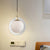 Globe Hanging Pendant Light Minimalist White Glass Single Bedside Suspended Lighting Fixture with Ring Arm White Clearhalo 'Ceiling Lights' 'Glass shade' 'Glass' 'Modern Pendants' 'Modern' 'Pendant Lights' 'Pendants' Lighting' 786707