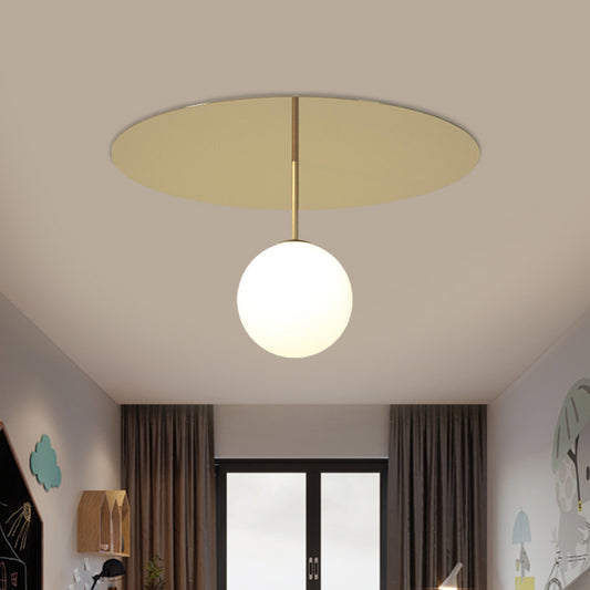 Cream Glass Ball Semi Flush Light Fixture Simple 1 Head Gold Ceiling Mount Lamp with Disc Canopy Gold Clearhalo 'Ceiling Lights' 'Close To Ceiling Lights' 'Close to ceiling' 'Glass shade' 'Glass' 'Semi-flushmount' Lighting' 786787