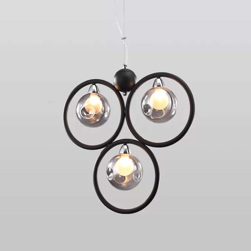 Smoke Grey Glass Dimpled Ball Drop Lamp Modern 3 Bulbs Pendant Chandelier with Black Hoop Arm Clearhalo 'Ceiling Lights' 'Chandeliers' 'Modern Chandeliers' 'Modern' Lighting' 786805