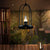Bulb-Shape Frosted Glass Hanging Pendant Factory Style 1 Bulb Country Club Suspension Lamp with Birdcage Frame in Black Black Clearhalo 'Art Deco Pendants' 'Black' 'Cast Iron' 'Ceiling Lights' 'Ceramic' 'Crystal' 'Industrial Pendants' 'Industrial' 'Metal' 'Middle Century Pendants' 'Pendant Lights' 'Pendants' 'Rustic Pendants' 'Tiffany' Lighting' 791586