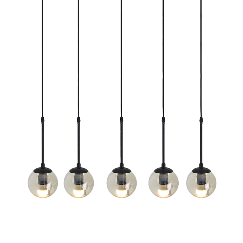 Clear Glass Black Cluster Pendant Light Globe 3/5/10 Heads Industrial Hanging Lamp Kit with Linear/Round Canopy Clearhalo 'Ceiling Lights' 'Chandeliers' 'Glass shade' 'Glass' 'Industrial Pendants' 'Industrial' 'Middle Century Pendants' 'Pendant Lights' 'Pendants' 'Tiffany' Lighting' 791762