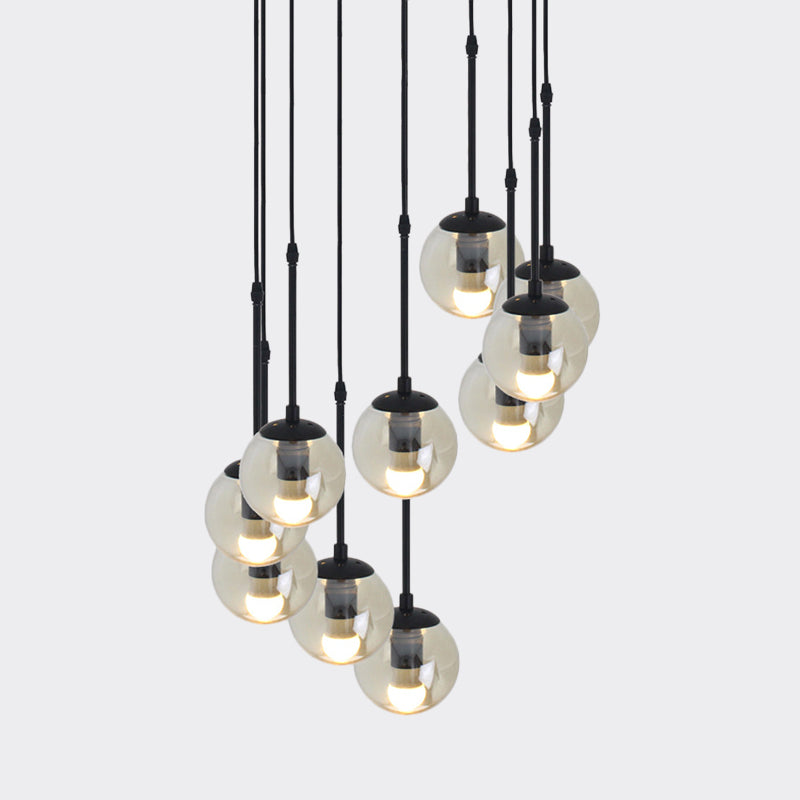 Clear Glass Black Cluster Pendant Light Globe 3/5/10 Heads Industrial Hanging Lamp Kit with Linear/Round Canopy Clearhalo 'Ceiling Lights' 'Chandeliers' 'Glass shade' 'Glass' 'Industrial Pendants' 'Industrial' 'Middle Century Pendants' 'Pendant Lights' 'Pendants' 'Tiffany' Lighting' 791777