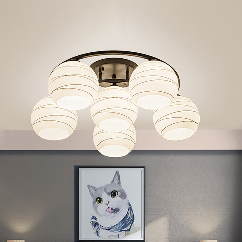 Moon Frame Iron Semi Mount Lighting Modern 3/6-Light Black Flush Lamp with Spherical White Glass Shade 6 Black Clearhalo 'Ceiling Lights' 'Close To Ceiling Lights' 'Close to ceiling' 'Glass shade' 'Glass' 'Semi-flushmount' Lighting' 798732