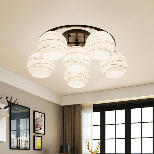 Moon Frame Iron Semi Mount Lighting Modern 3/6-Light Black Flush Lamp with Spherical White Glass Shade Clearhalo 'Ceiling Lights' 'Close To Ceiling Lights' 'Close to ceiling' 'Glass shade' 'Glass' 'Semi-flushmount' Lighting' 798734