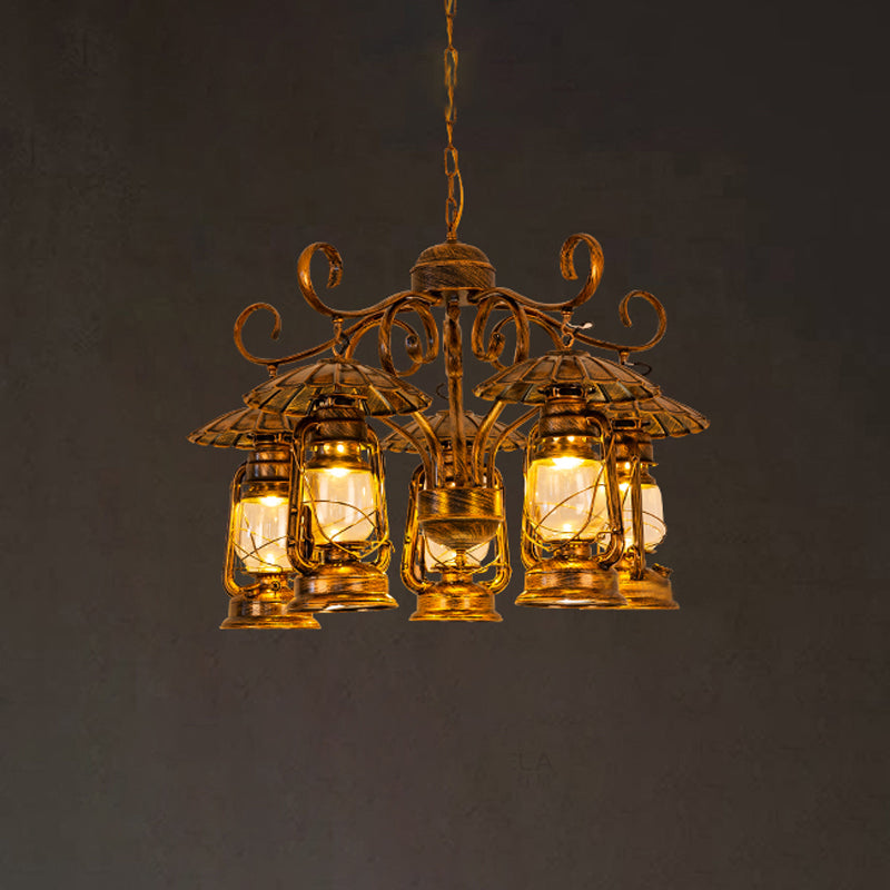 Aged Brass Lantern Suspension Light Village Style Metal and Clear Glass 5 Light Dining Room Chandelier Clearhalo 'Ceiling Lights' 'Chandeliers' 'Close To Ceiling Lights' 'Glass shade' 'Glass' 'Industrial Chandeliers' 'Industrial' 'Middle Century Chandeliers' 'Tiffany' Lighting' 799025