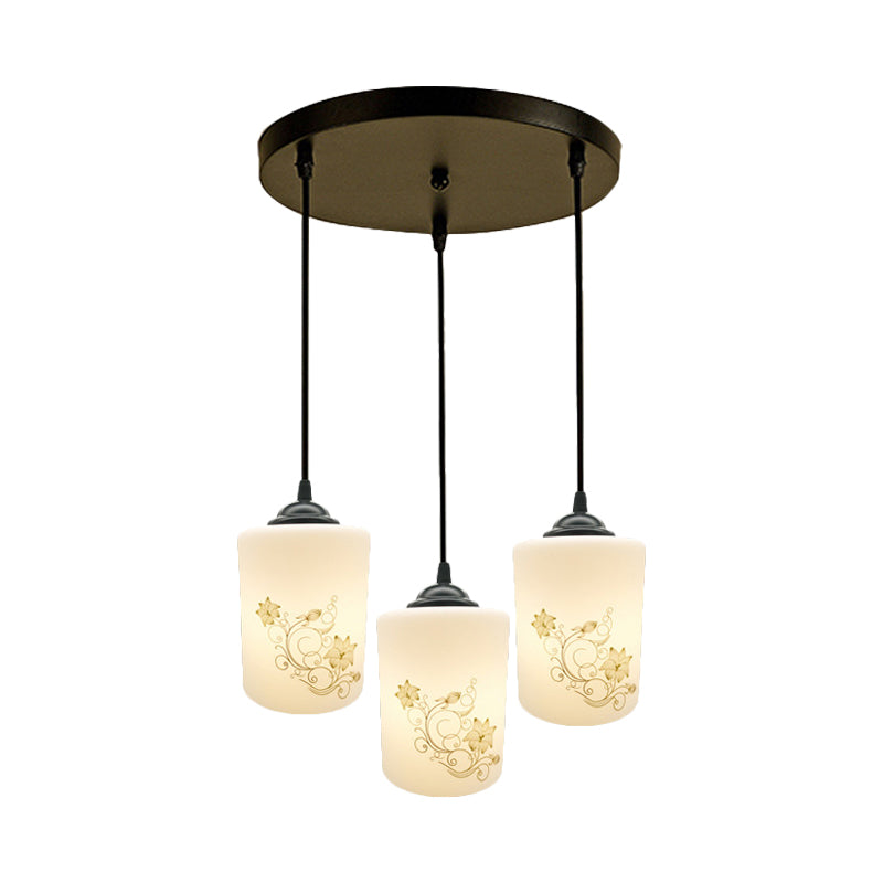 Cylinder Dining Room Multi Ceiling Light Modern White Printed Glass 3-Head Black Hanging Pendant with Linear/Round Canopy Clearhalo 'Ceiling Lights' 'Glass shade' 'Glass' 'Pendant Lights' 'Pendants' Lighting' 802003