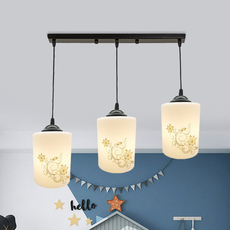Cylinder Dining Room Multi Ceiling Light Modern White Printed Glass 3-Head Black Hanging Pendant with Linear/Round Canopy White A Linear Clearhalo 'Ceiling Lights' 'Glass shade' 'Glass' 'Pendant Lights' 'Pendants' Lighting' 802013