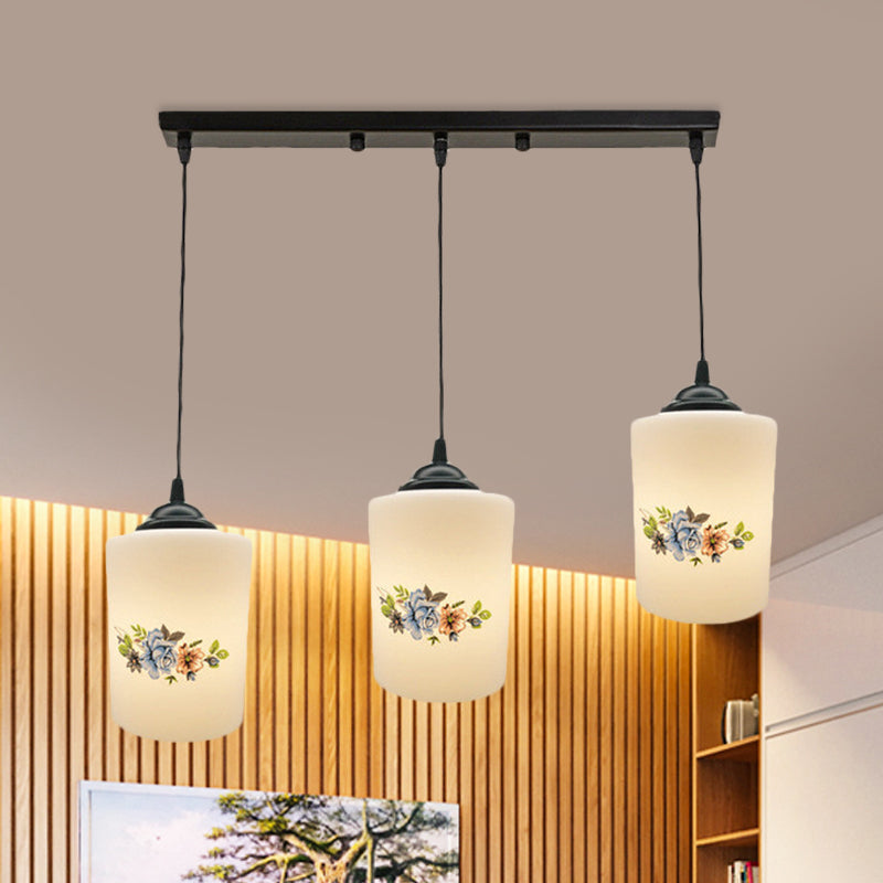 Cylinder Dining Room Multi Ceiling Light Modern White Printed Glass 3-Head Black Hanging Pendant with Linear/Round Canopy White C Linear Clearhalo 'Ceiling Lights' 'Glass shade' 'Glass' 'Pendant Lights' 'Pendants' Lighting' 802022