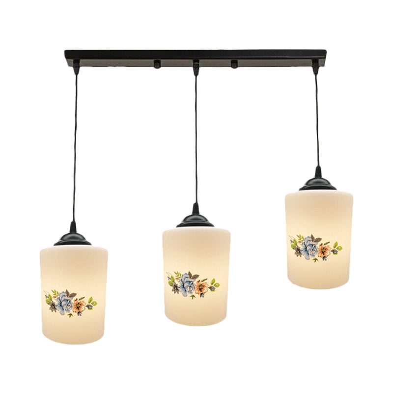 Cylinder Dining Room Multi Ceiling Light Modern White Printed Glass 3-Head Black Hanging Pendant with Linear/Round Canopy Clearhalo 'Ceiling Lights' 'Glass shade' 'Glass' 'Pendant Lights' 'Pendants' Lighting' 802025