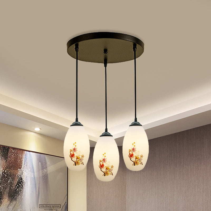 3 Bulbs Multiple Hanging Light Modern Oblong Frosted White Glass Linear/Round Canopy Pendulum Lamp with Flower Pattern White C Round Clearhalo 'Ceiling Lights' 'Glass shade' 'Glass' 'Pendant Lights' 'Pendants' Lighting' 802059