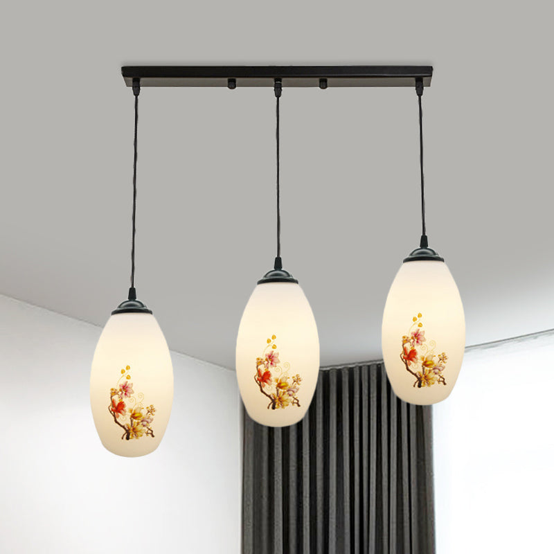 3 Bulbs Multiple Hanging Light Modern Oblong Frosted White Glass Linear/Round Canopy Pendulum Lamp with Flower Pattern White C Linear Clearhalo 'Ceiling Lights' 'Glass shade' 'Glass' 'Pendant Lights' 'Pendants' Lighting' 802075