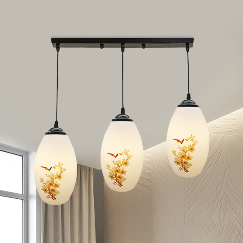 3 Bulbs Multiple Hanging Light Modern Oblong Frosted White Glass Linear/Round Canopy Pendulum Lamp with Flower Pattern White B Linear Clearhalo 'Ceiling Lights' 'Glass shade' 'Glass' 'Pendant Lights' 'Pendants' Lighting' 802080