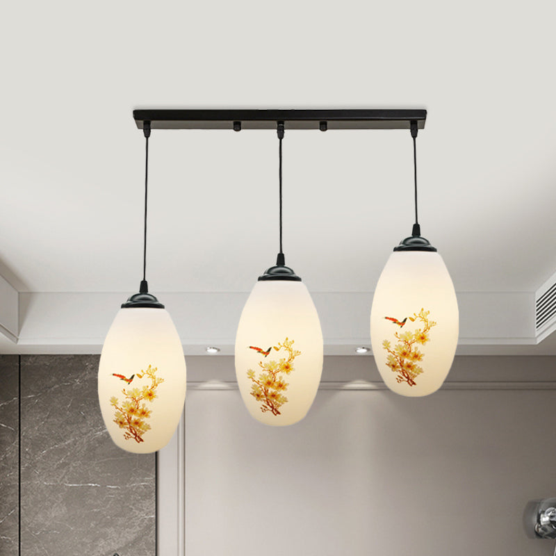 3 Bulbs Multiple Hanging Light Modern Oblong Frosted White Glass Linear/Round Canopy Pendulum Lamp with Flower Pattern Clearhalo 'Ceiling Lights' 'Glass shade' 'Glass' 'Pendant Lights' 'Pendants' Lighting' 802081