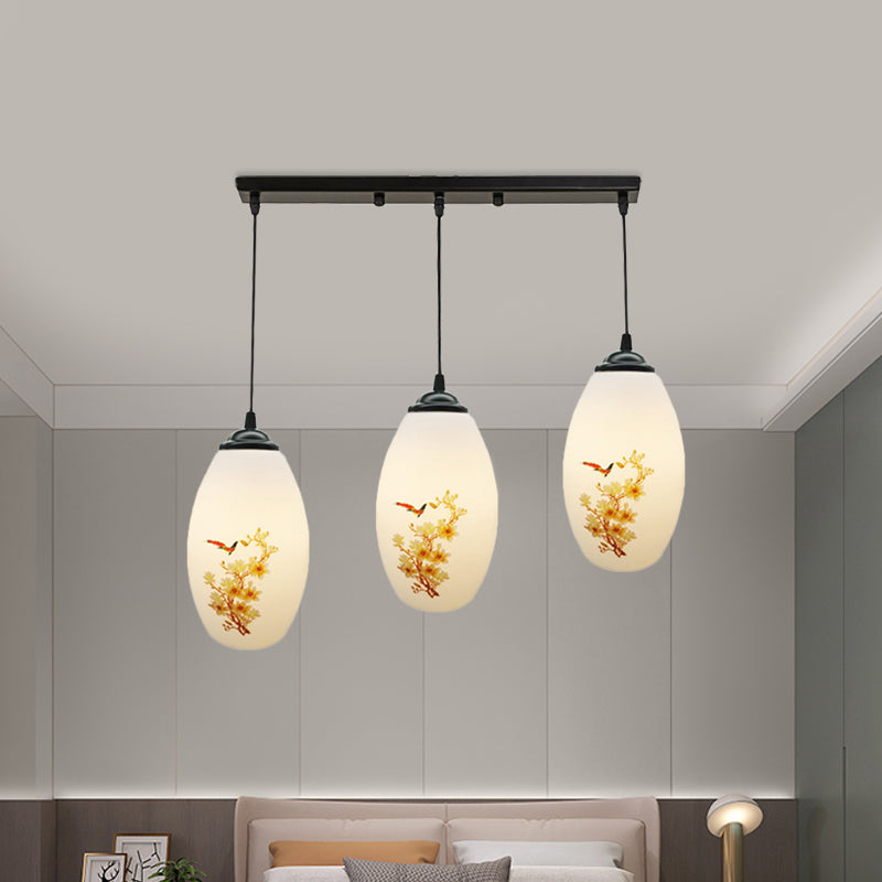 3 Bulbs Multiple Hanging Light Modern Oblong Frosted White Glass Linear/Round Canopy Pendulum Lamp with Flower Pattern Clearhalo 'Ceiling Lights' 'Glass shade' 'Glass' 'Pendant Lights' 'Pendants' Lighting' 802082